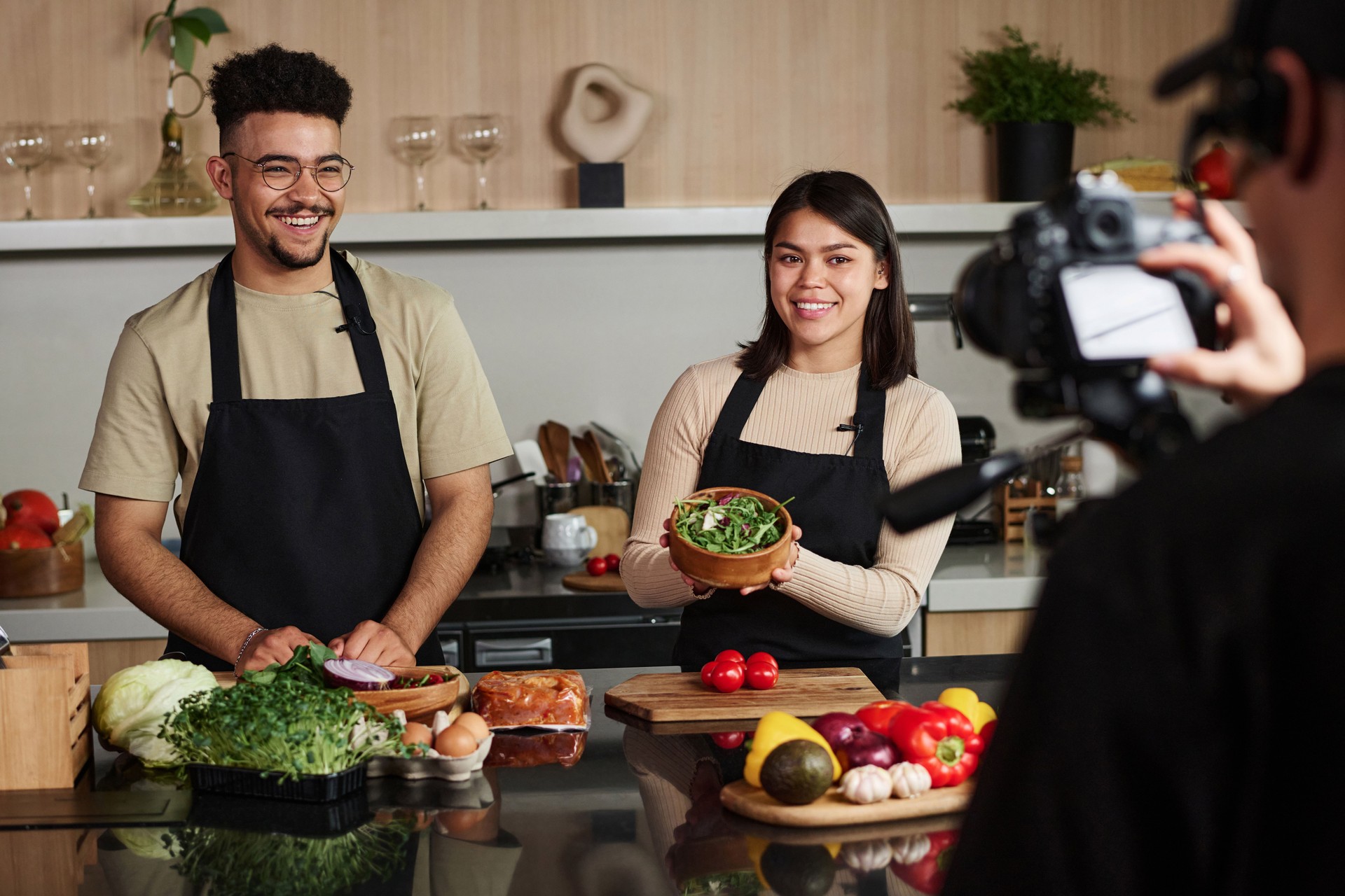 Young Man and Woman on Set of Culinary Show